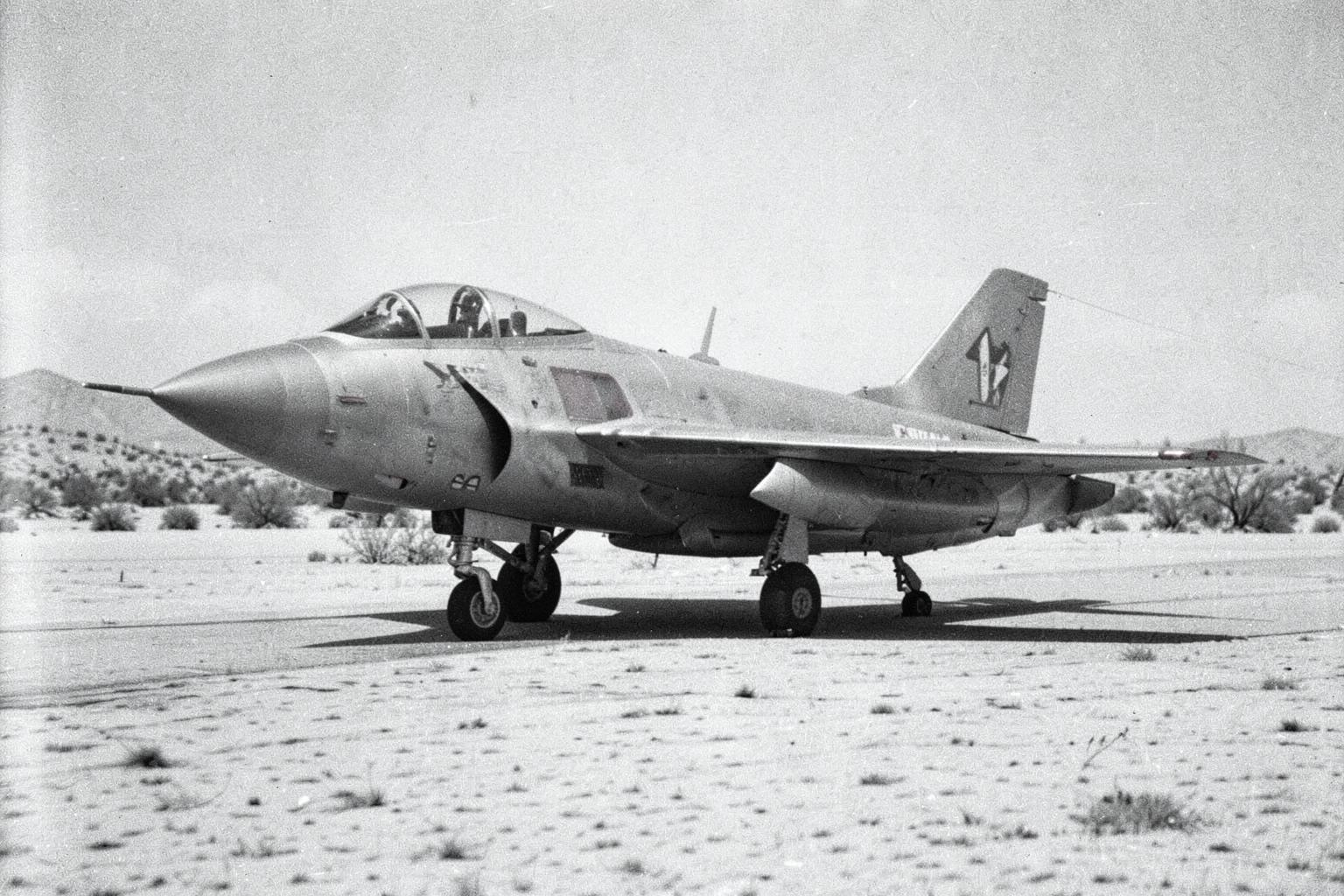 An F-86 Sabre jet on a desert runway